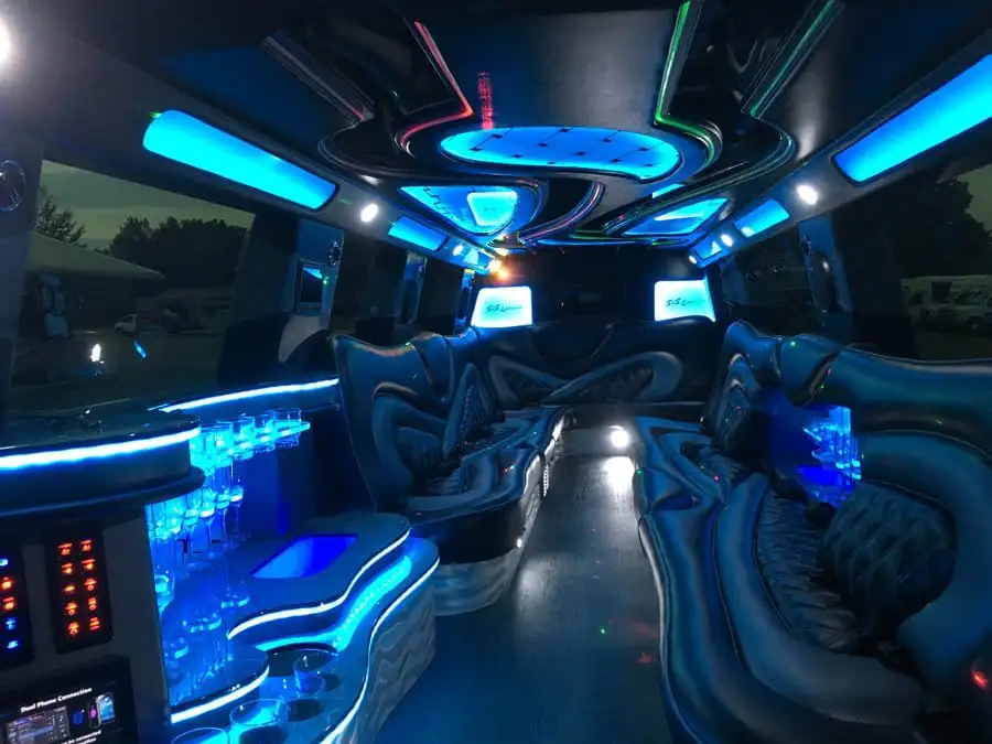 White Infiniti QX80 stretch SUV limousine