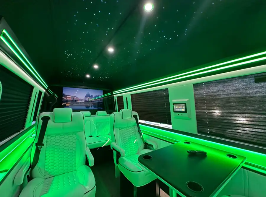 Black Mercedes Jet Sprinter limo with first-class seating